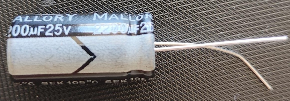Mallory 2200µF 25V electrolytic capacitor — through-hole component used in power supply repair